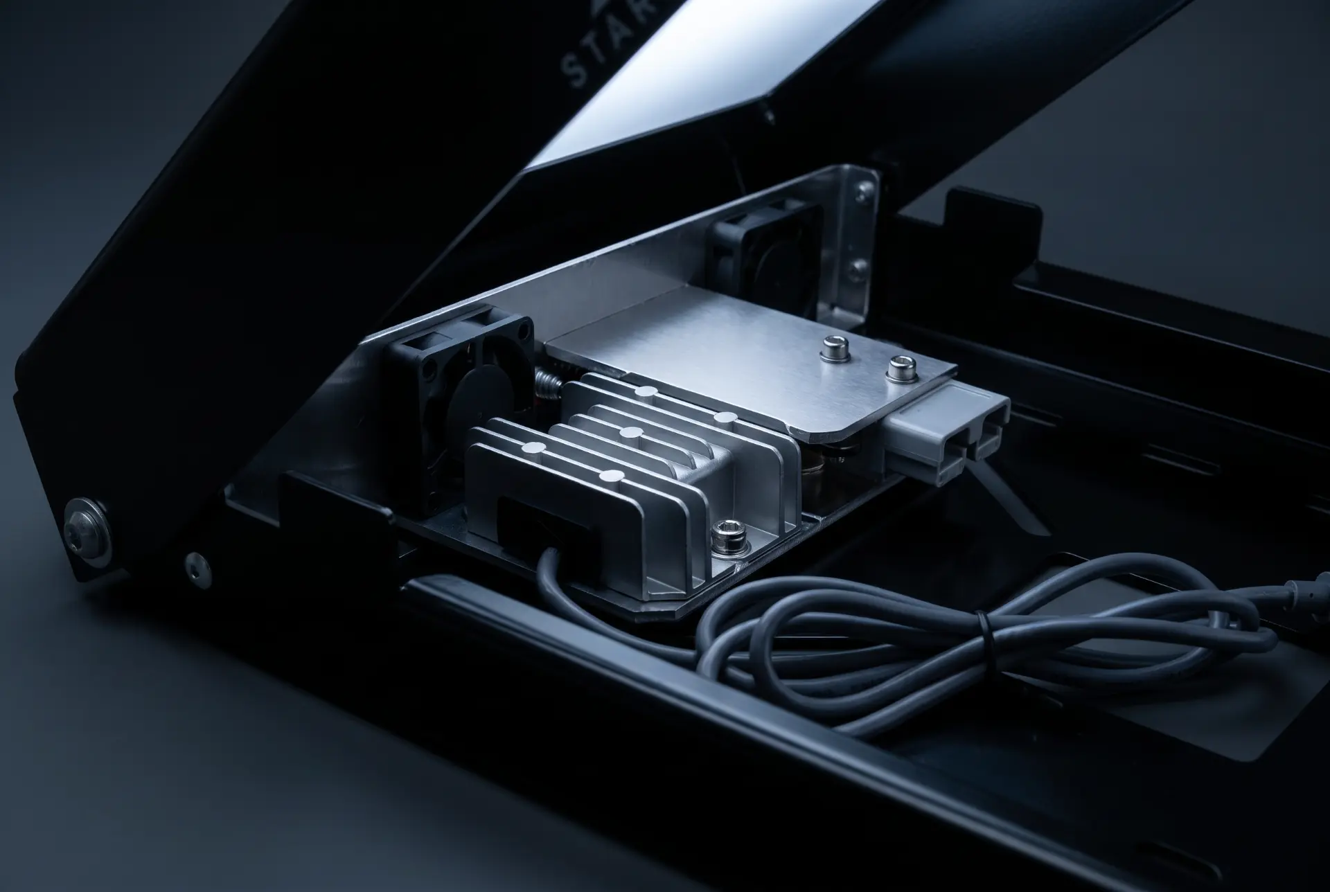 Cutaway view of the Fan-Cooled Rooftop Power Hub with the mount opened, showing anderson plug — 12v input, 30v step-up converter, dual ip67 cooling fans, oem sealed output plug.